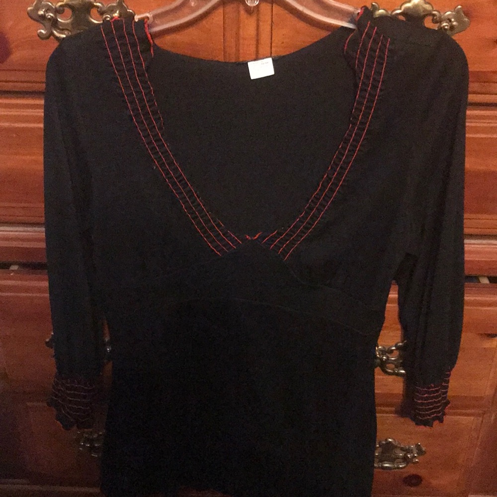 Woman’s long sleeved blouse